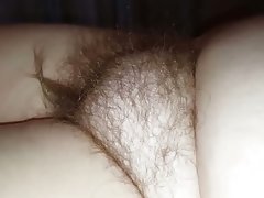 Curling the hair on her hairy