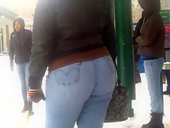 Tight blue jeans booty