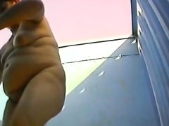 Fat chick gets naked to try on